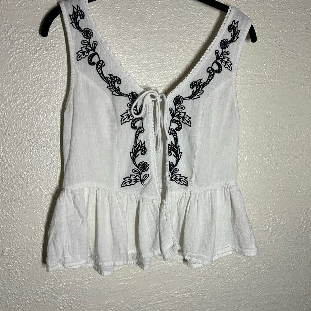 Dizzy Lizzy Embroidered Tie-Front White Peplum Camisole